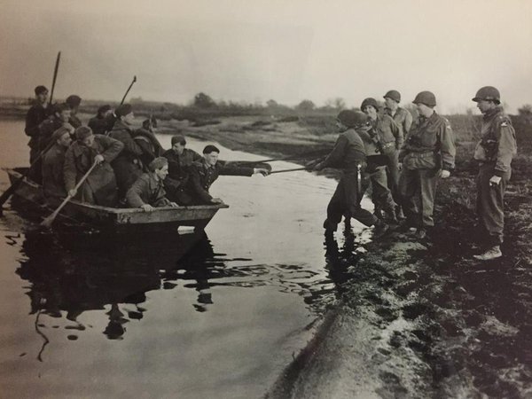 Germans rowing the Elbe River to surrender to the 335th Regiment, 84th Division